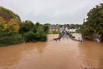 River Clun flooded at Clun Bridge